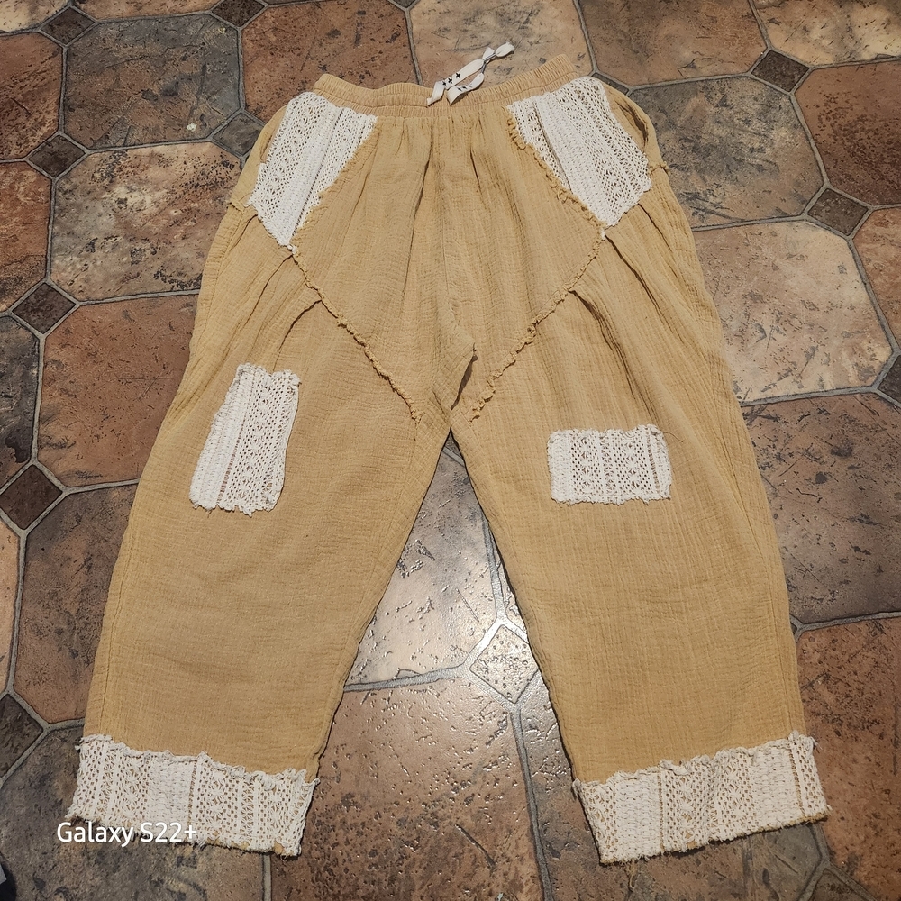 POL Women's Pants  Beige Pants with Lace Accents Size S.